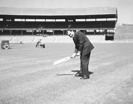 It's not nowdays we have dodgy presidents ... US Vice President Richard Nixon holding cricket bat at Melbourne Cricket Ground during visit leading up to the 1956 Olympics