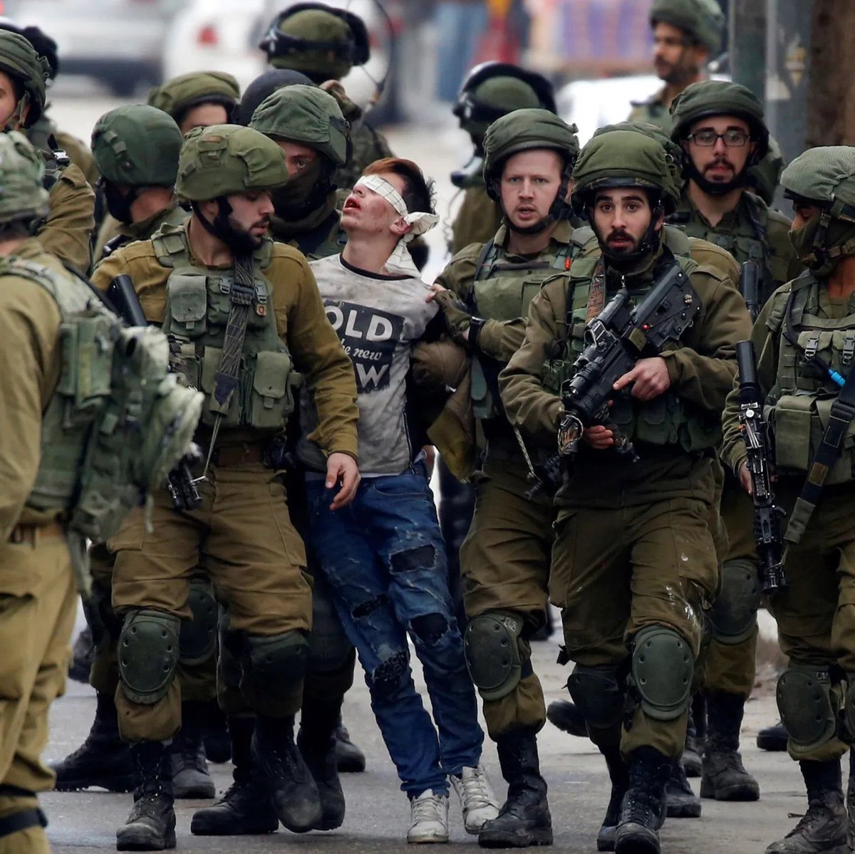 Palestinedaily1's tweet image. STFU and look at this.

Look at his face.
That’s a Palestinian child 
being Kidnapped by Israeli soldiers.

We fucking failed as humans.