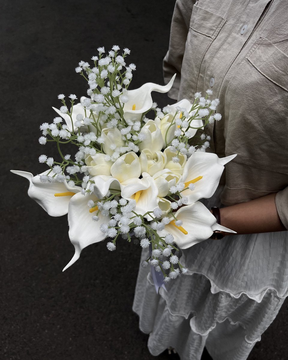 calla lily, baby breath, &amp; tulip.