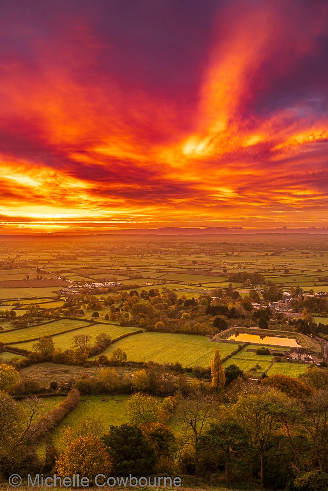 Fire in the sky this morning. Photo taken on Glastonbury Tor looking out over the Somerset levels.