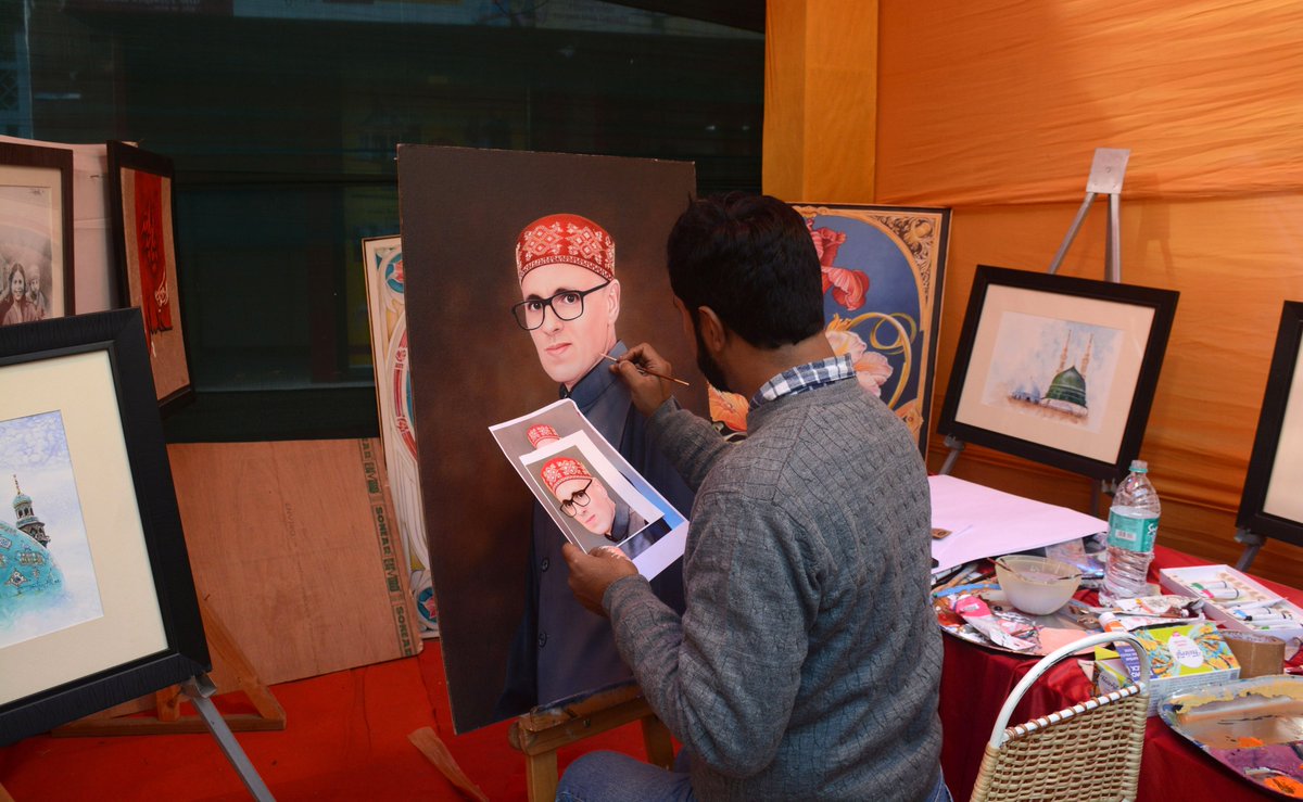 An artist paints a portrait of Jammu and Kashmir Chief Minister Omar Abdullah during the exhibition “Soulful Kashmir – Know Your Artisan” at Poloview in Srinagar, on Thursday.

Photo: KM / Umar Ganie