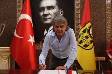 First image shows two men in suits signing documents on a table with pens, surrounded by Turkish and yellow-black club flags, a large portrait of Mustafa Kemal Atatürk on the wall, decorative flowers, and ornate wooden elements in a formal room. Second image depicts a man in light blue shirt and gray pants signing a document on a table, with Turkish and club flags, Atatürk portrait, and similar decor. Third image features three men posing together, one in dark hoodie and vest, one in light blue shirt, and one in suit, standing arm-in-arm in front of Atatürk portrait and flags in the same ornate room setting.