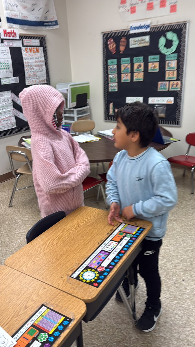 2nd graders turn and talk to deepen their understanding!