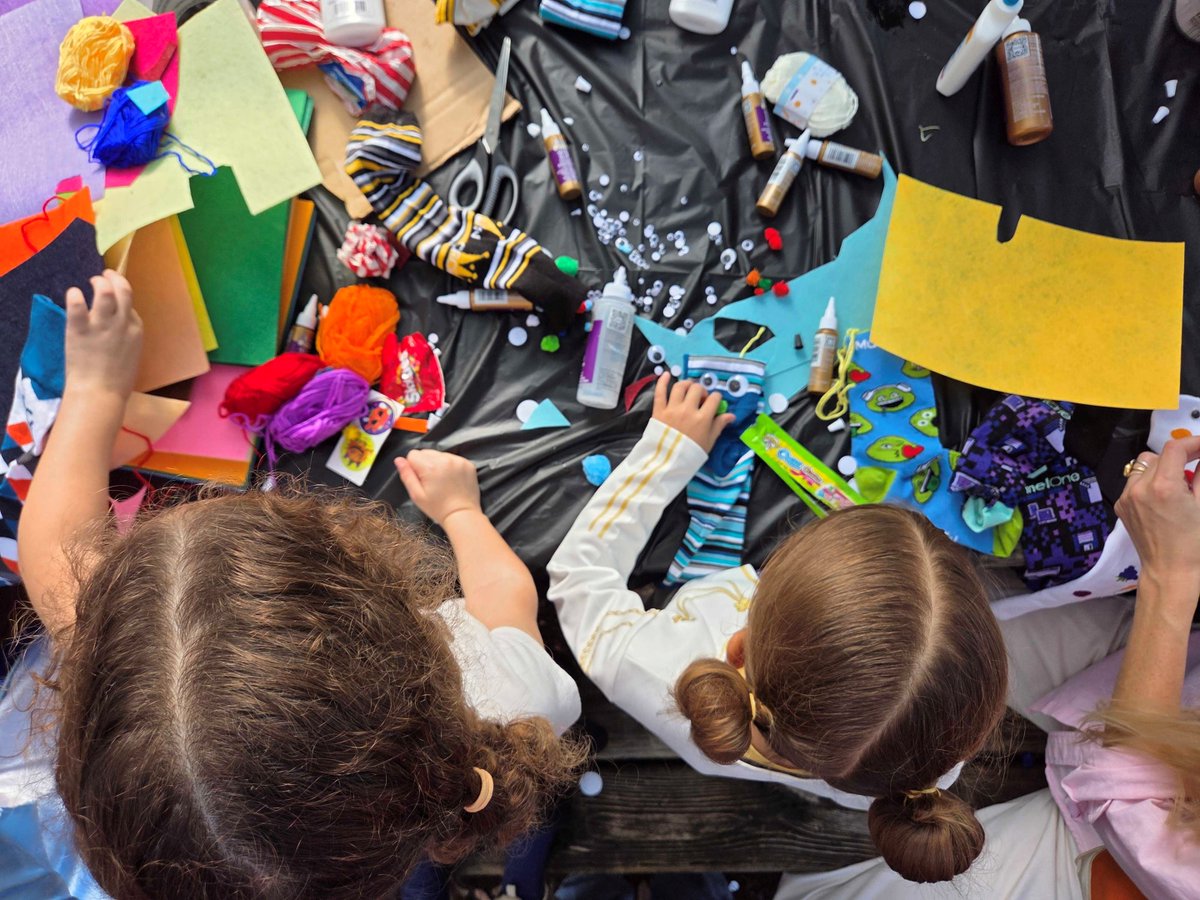 Our socks got a spooky makeover at Lee Elementary's Monster Bash, becoming the stars of the show—monster puppets! 🧦👻 #CommunityLove #SpookySeason