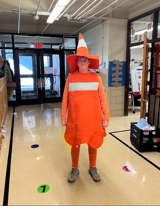 No traffic jams here! 🚧 Today, our very own traded her safety gear for a safety cone costume! She keeps dismissal running smoothly every day — and brought some Halloween fun to it too! Give her a wave this afternoon! 👋🧡 #SafetyStar #HalloweenFun #TeamMarycrest