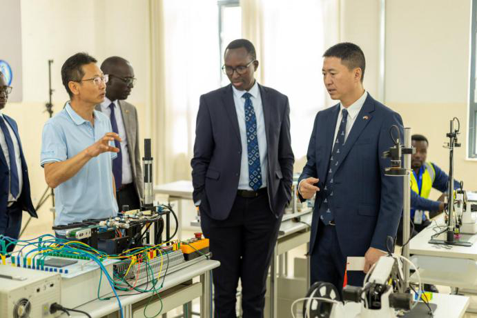 ChinaEmbinRW's tweet photo. 2) Accompanied by Mr. NGENDAHIMANA Pascal, Executive Secretary of Northern Province, and Eng. ABAYISENGA Emile, Principal of Rwanda Polytechnic-Musanze, Amb. Gao visited the campus of IPRC Musanze and Luban Workshop. He encouraged the students to endeavor for excellence and devote themselves to the vision of Rwanda.