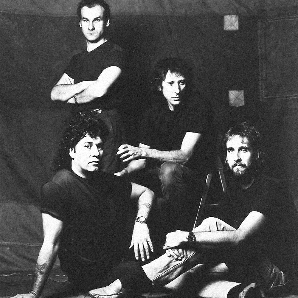 Mike + The Mechanics for the press kit of their debut, self-titled album (1985). 

Revisit the album, 40 years later: lnkfi.re/MATM85