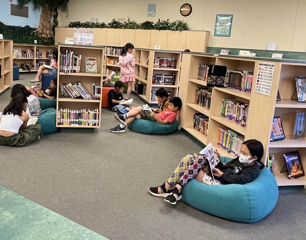 Patriots escaping the heatwave with a good book during recess. #Panterapatriots #patriotshavepride