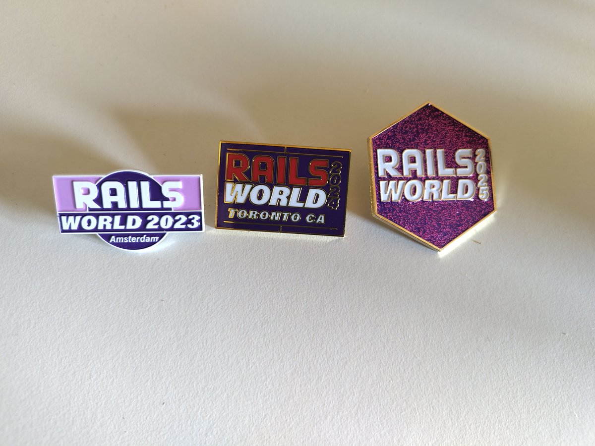 Some people collect stamps, I collect Rails World pins!