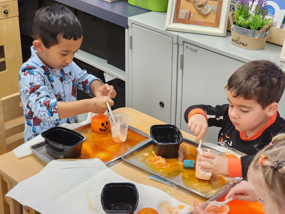 PreK Scientists creating an "eruption" by mixing baking soda, vinegar, and food coloring. This reaction is a simple and fun way to teach children about chemical reactions and cause-and-effect! <a href="/GreeceELC/">Greece Community Early Learning Center (ELC)</a>
