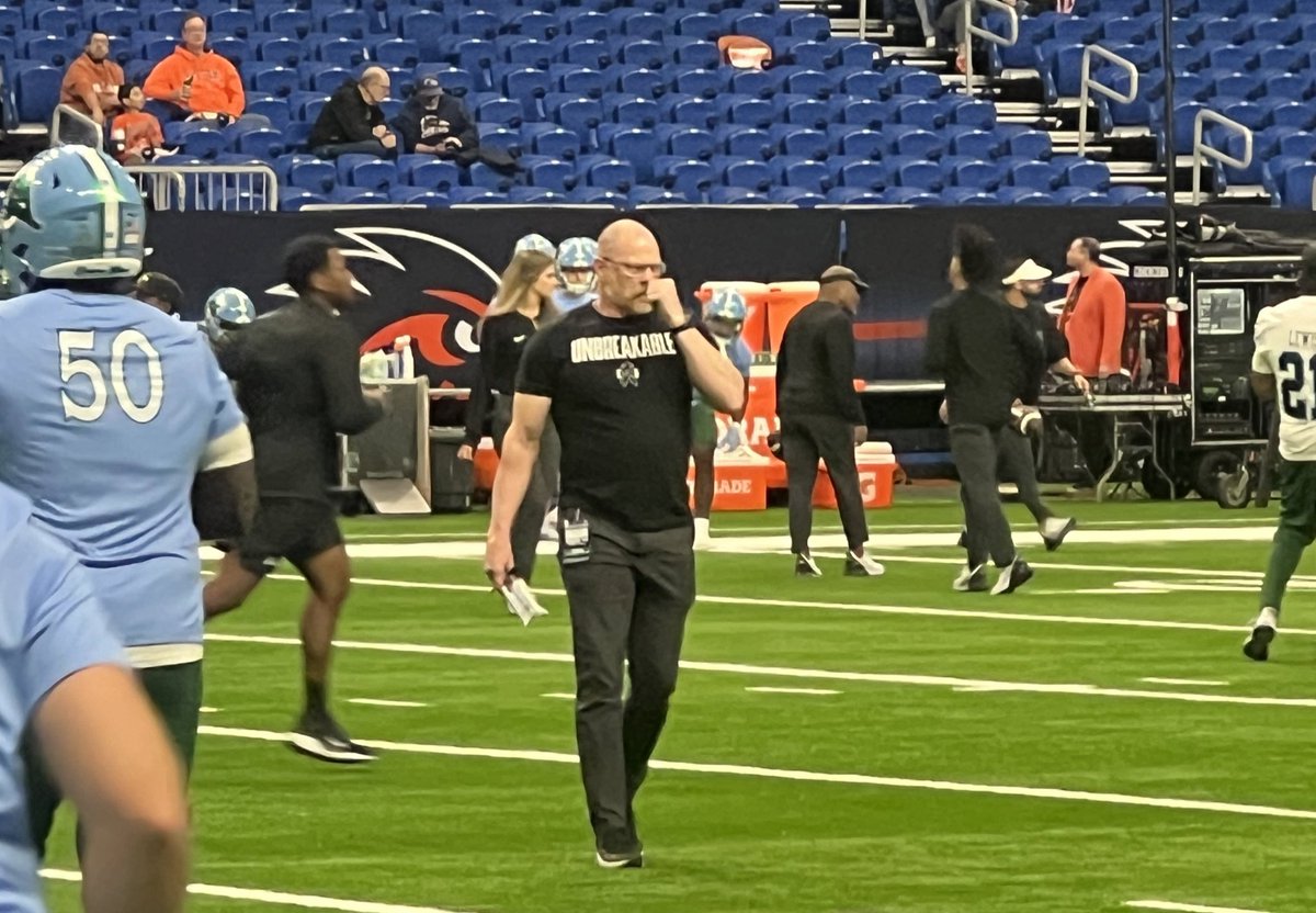 Tulane strength and conditioning coach Rusty Whitt is wearing an “Unbreakable” shirt in honor of Kurt Hester, who was his predecessor at Tulane