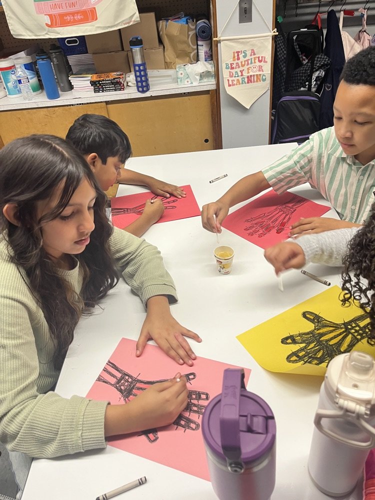 Play of the day... Halloween Science!
Ms. Lewkowitz's scientists explored the human skeleton and created spooky x-rays of their hands to celebrate Halloween fun and learning!