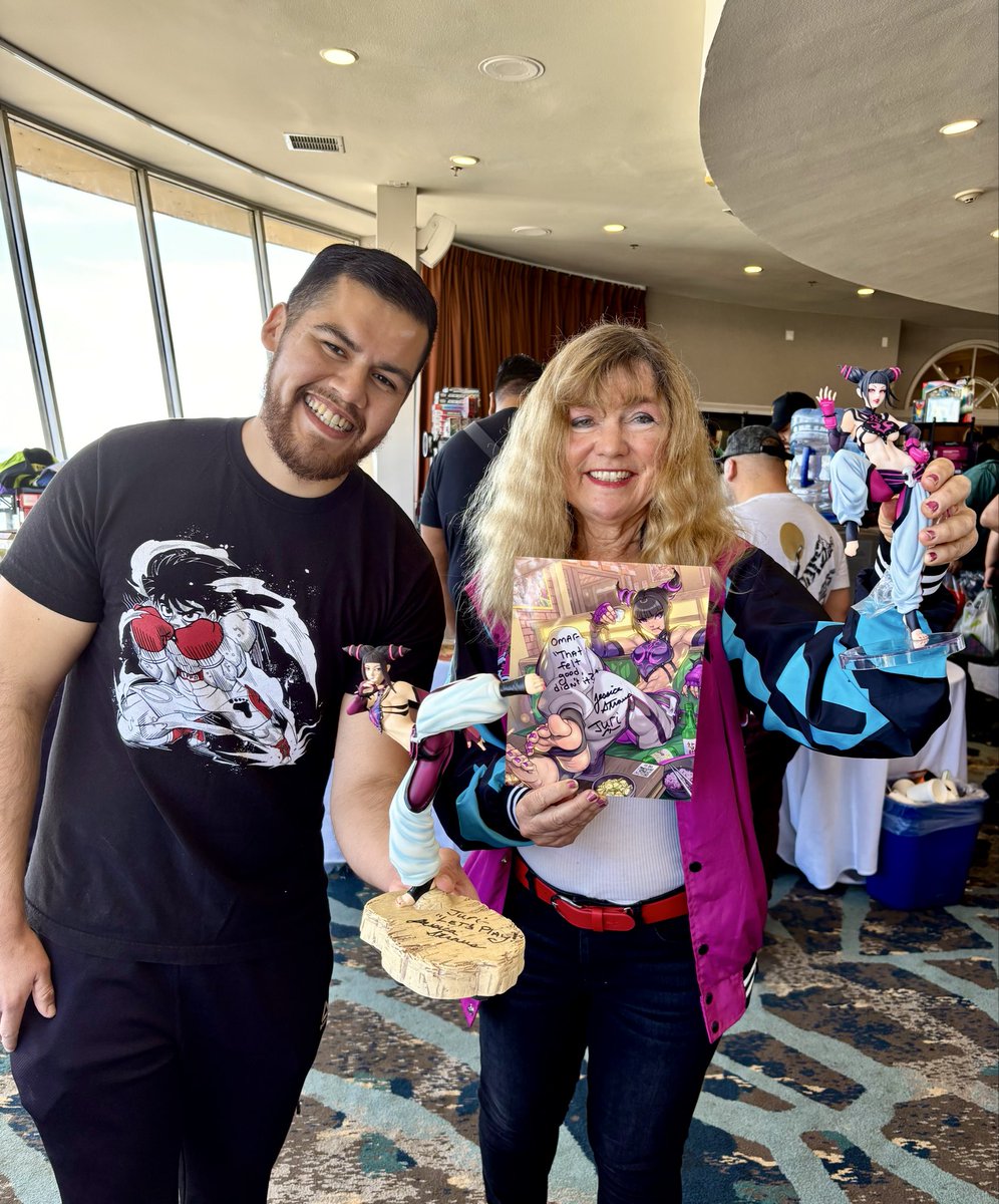 I’m always happy, &amp; honored &amp; when #fans of #streetfighter have me sign #jurihan figures. 

A big thank you to Omar for his enthusiastic support of one of my favorite characters to voice. 💕❤️

A big thank you to @fusiontradeshow ! 
Signed artwork by <a href="/ironpinky/">Edwin Huang</a> 
#sf6 #voiceover