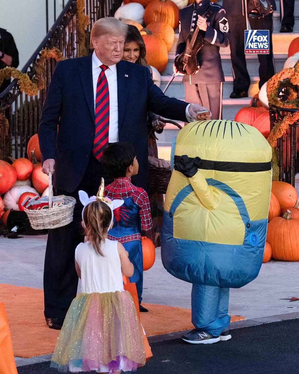 DÉJÀ 'BOO': President Trump puts a candy bar on a trick-or-treater's head at the White House — the same way he famously did back in 2019