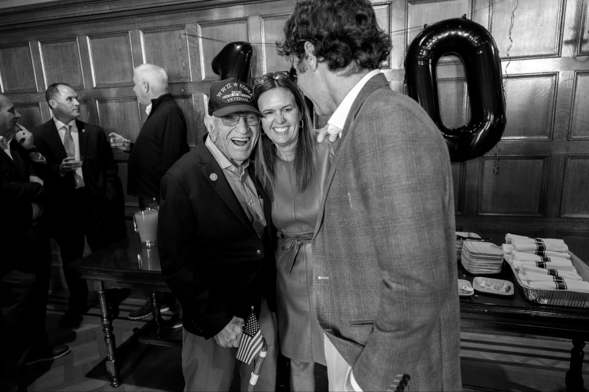 SarahHuckabee's tweet photo. It’s not often you get to throw a surprise party for someone’s 100th birthday!

Floyd Brantley isn’t just a good friend - he’s a World War II, Korea, and Vietnam veteran.

As his favorite shirt says: “Hug a vet - Even the old ones!” We love you Floyd! https://t.co/gXKE7nWOMc