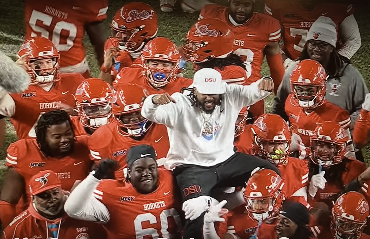 Delaware State football players carry DeSean Jackson off the field at Lincoln Financial Field after the Hornets big victory over Michael Vick and Norfolk State.