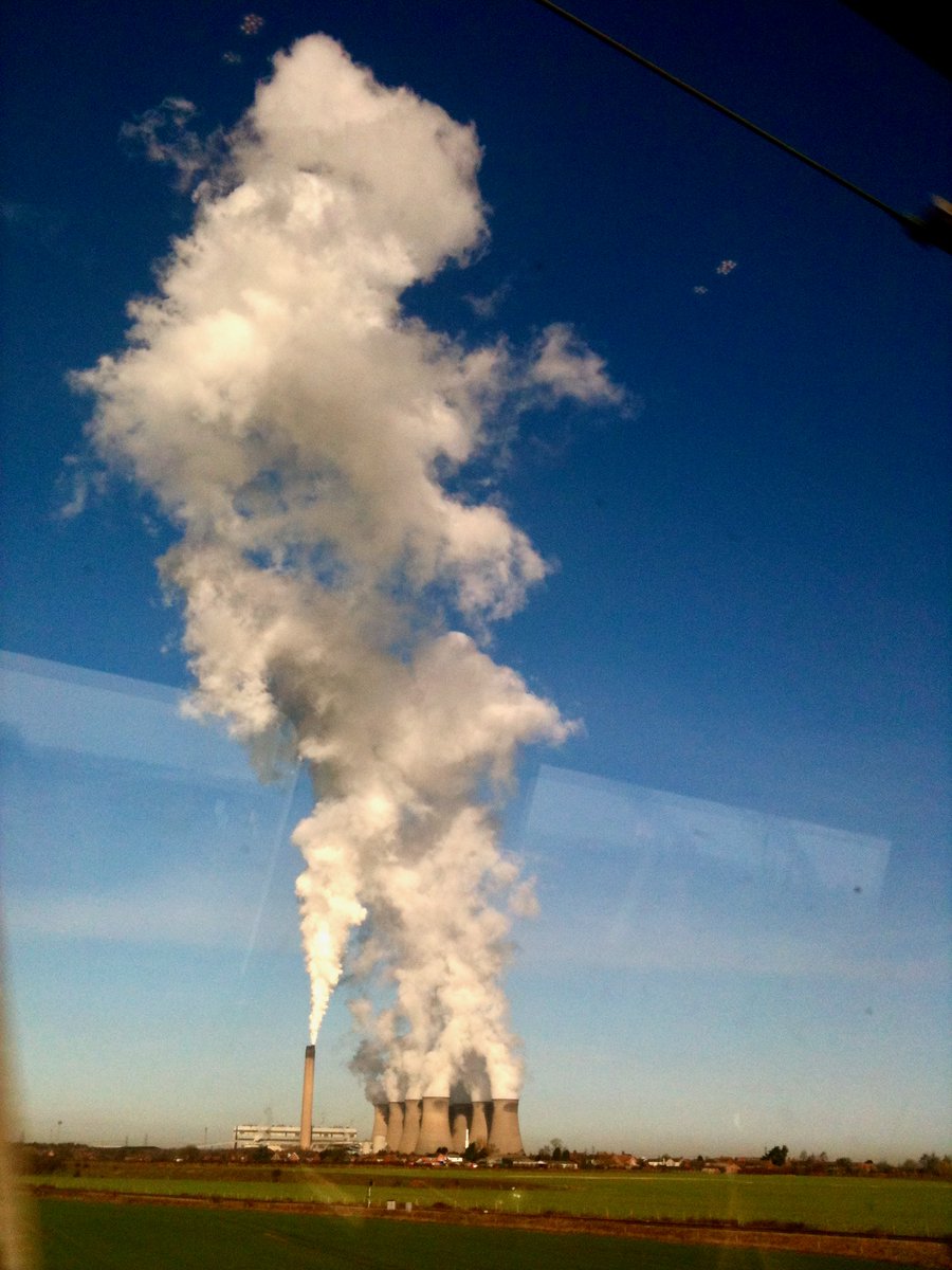 Always photograph the everyday scenes you take for granted. At the time I took it, this was an idle snap from an ECML train window, as I just liked the light and still air, creating the near vertical cloud of power station steam.