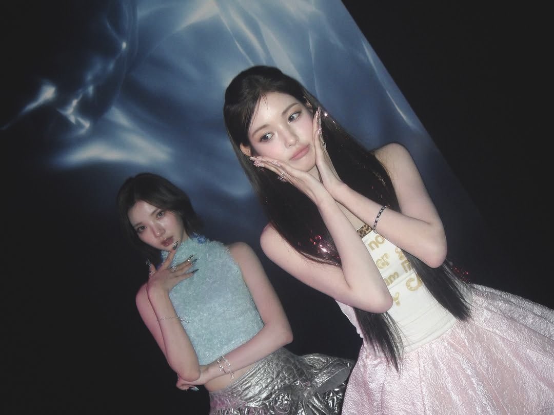 Yuhai's tweet image. the shimmer on my nails, the glow on my cheek, the sparkle in my eyes, everything’s giving pretty obsession! and guess what, jiwoo onny’s here too, making the frame even more dreamy.