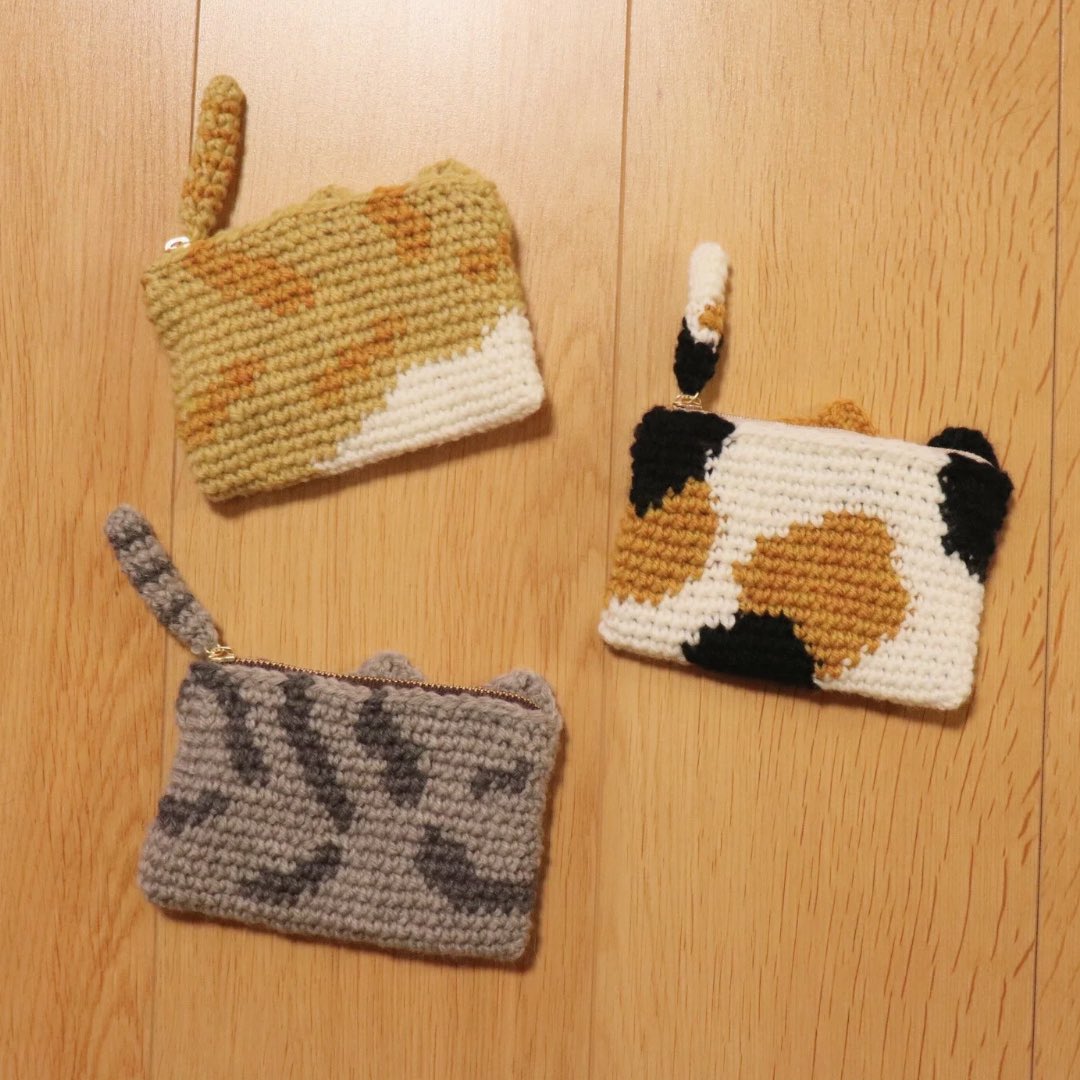 chima_taki's tweet image. 猫ポーチに柄をつけて編んでみました🐱