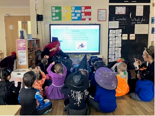 Nursery children have been creating their own spells, using their fine motor skills to add resources into a cauldron. We have been using our senses to explore a range of materials including a pumpkin.