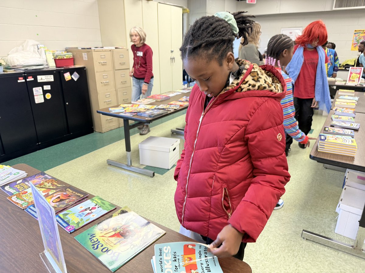 Smiles, stories, and stacks of books! Thank you to the Rowena Foundation for gifting our students the joy of reading!