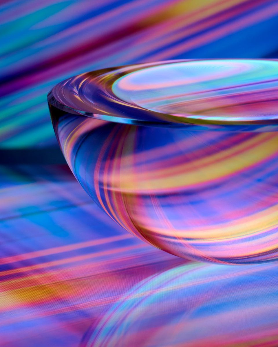 joeyterrill's tweet image. This is a hemispheric magnifier—the kind you might place on a page to read small text—resting atop one tablet, while another provides a background and reflection.

Nikon Z 8 | Nikkor Z MC 105mm f/2.8 VR S @NikonUSA #NikonZ8 #NikkorZ #NikonPro #NikonAmbassador