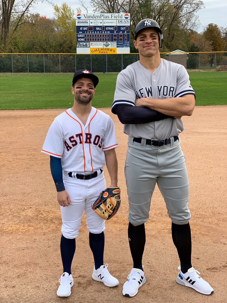 Jimmy Graham and his athletic trainer do their best Aaron Judge and Jose Altuve impression