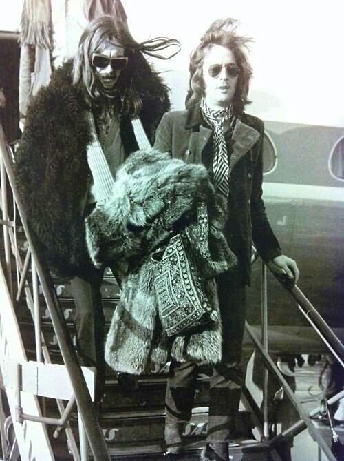 crockpics's tweet photo. George Harrison and Eric Clapton stepping off a plane, 1969 https://t.co/UFXTgexWOn