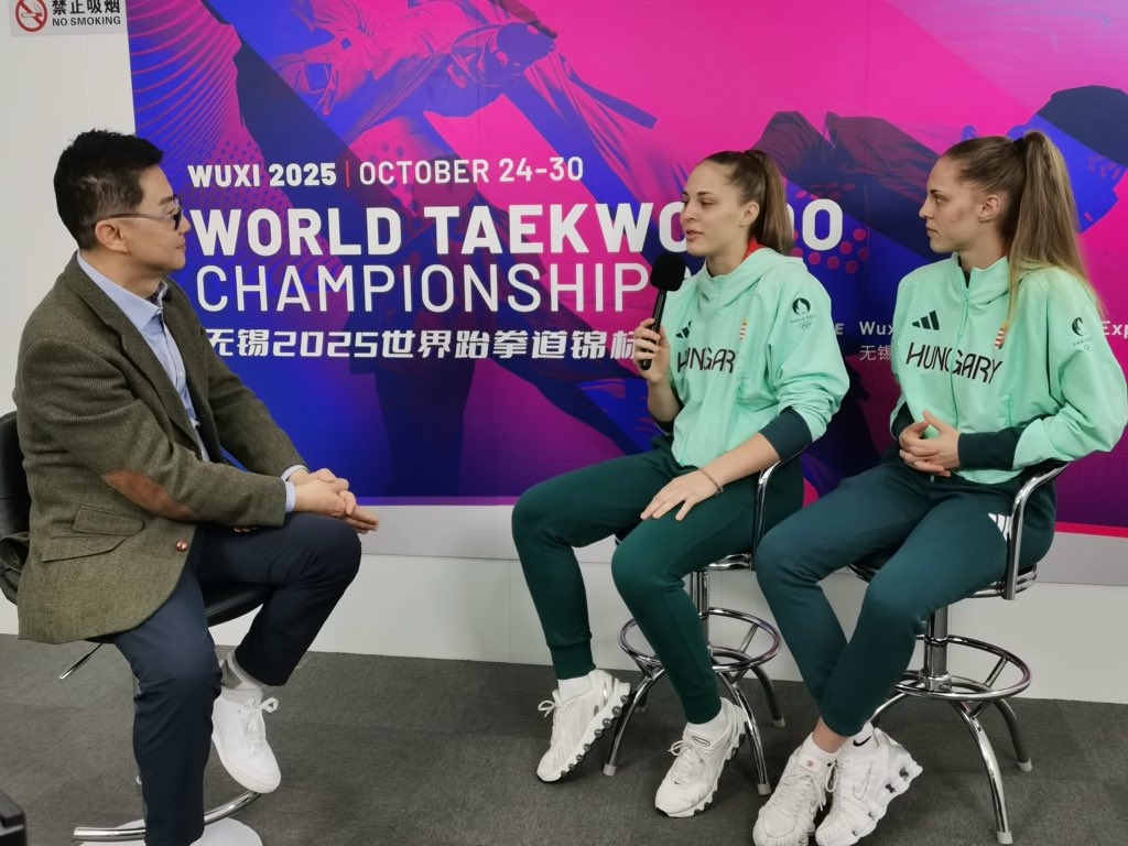 wang4332's tweet photo. A chat with Hungarian taekwondo twin sisters Luana and Viviana at the 2025 World Championships. https://t.co/k6fvUrkZJQ
