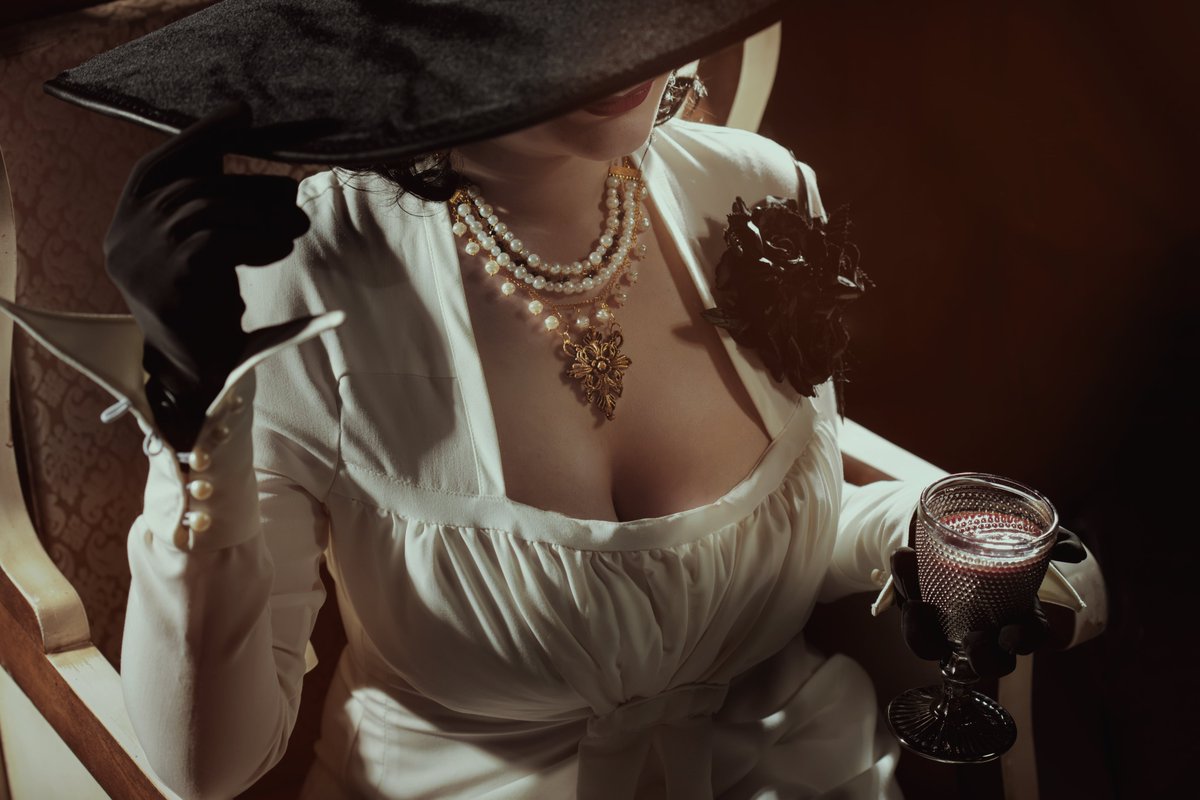 “Happy Halloween, my little morsels~ Lady Dimitrescu is feeling thirsty tonight.” 🍷🕸️