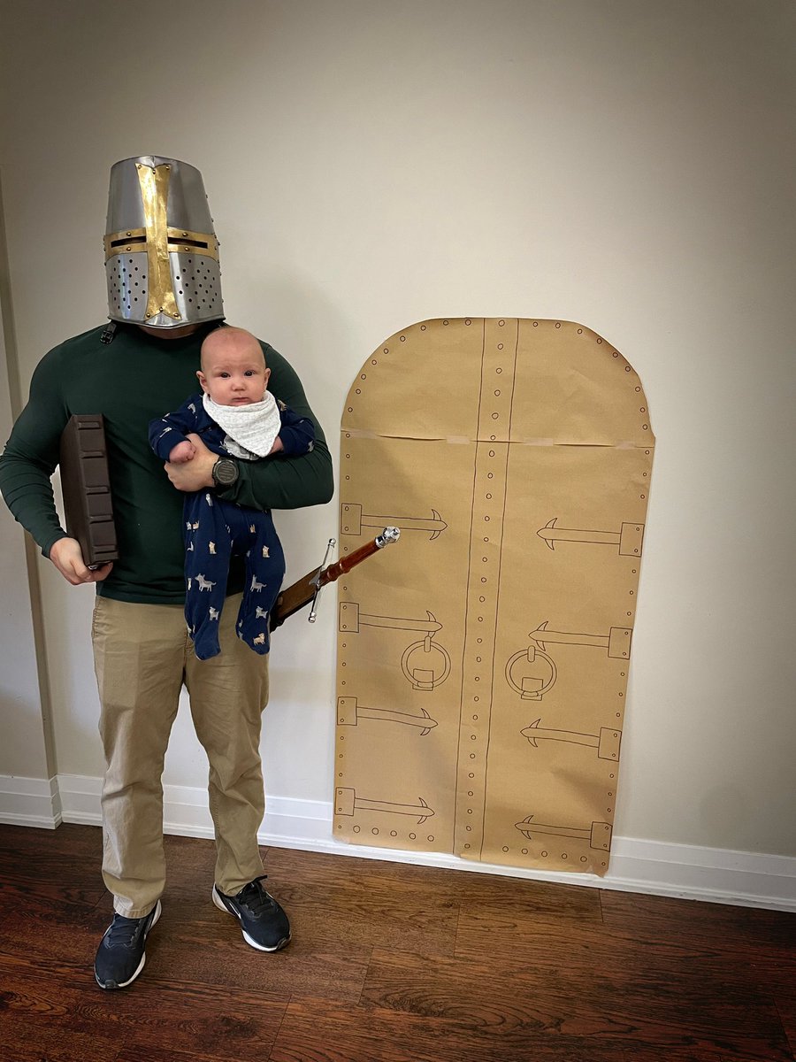 WesleyLHuff's tweet photo. Homeschooling Reformation Day party. I’m dressed as Junker Jörg (meaning "Squire George" or "Knight George"). This was Martin Luther’s alter ego after the Diet of Worms in 1521 during the time he was in hiding while translating the Bible into German. 

Here you can see me with my German Bible, and son Hans Luther (also known as Johannes, he was Luther’s eldest son), standing next to the door at All Saints' Church, Wittenberg (of which the kids played “pin the Theses on the door with).