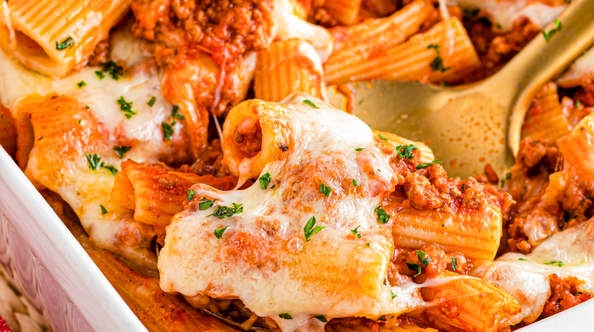 Bubbling baked rigatoni with beef, mozzarella, Parmesan, and red sauce. Golden edges, melted cheese, and pure comfort in one easy baked #pasta recipe. #NoblePig Recipe: noblepig.com/baked-rigatoni…