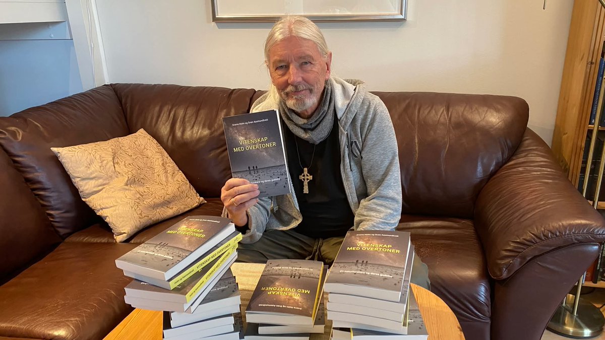My coauthor with the first copies of our new book: "Science with overtones: 21 scientists and their faith in God"
