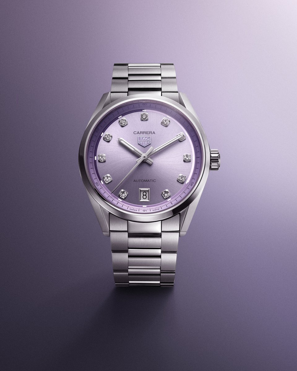 TAGHeuer's tweet image. The TAG Heuer Carrera Date, presented in a pastel-hued lilac, brings a fresh and sophisticated touch to the Carrera collection, infusing it with a renewed sense of elegance. Its snail-brushed dial is adorned with 11 diamonds that catch the light with subtle brilliance, drawing…