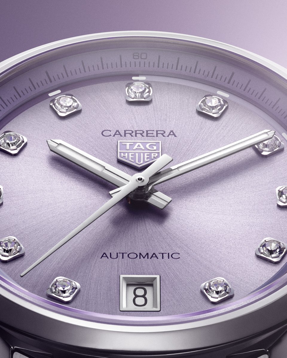TAGHeuer's tweet image. The TAG Heuer Carrera Date, presented in a pastel-hued lilac, brings a fresh and sophisticated touch to the Carrera collection, infusing it with a renewed sense of elegance. Its snail-brushed dial is adorned with 11 diamonds that catch the light with subtle brilliance, drawing…