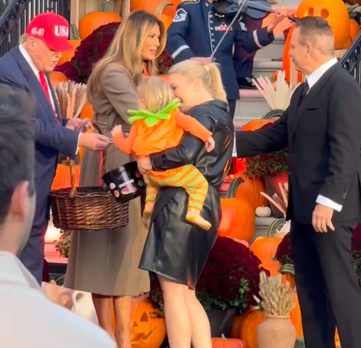 Melania Trump (55) and Donald Trump (79) with Karoline Leavitt (28) and her husband, Nicholas Riccio, (60)