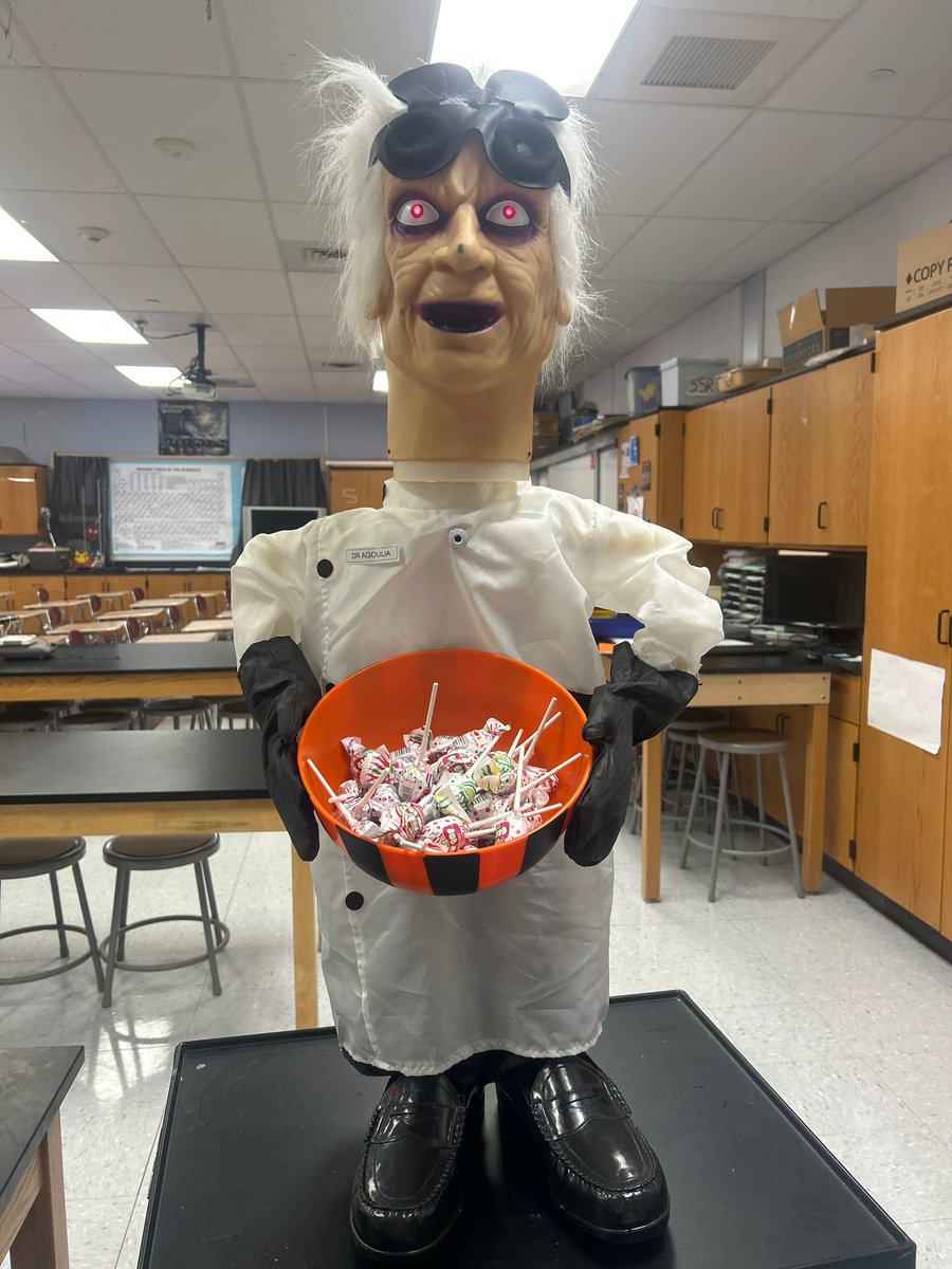 OBHSMrWasserman's tweet image. Halloween at OBHS.  Dr Aghoulia, painting pumpkins.  Will the pumpkin float? (Density of a pumpkin). #ThisIsHowWeDoIt #OBHS