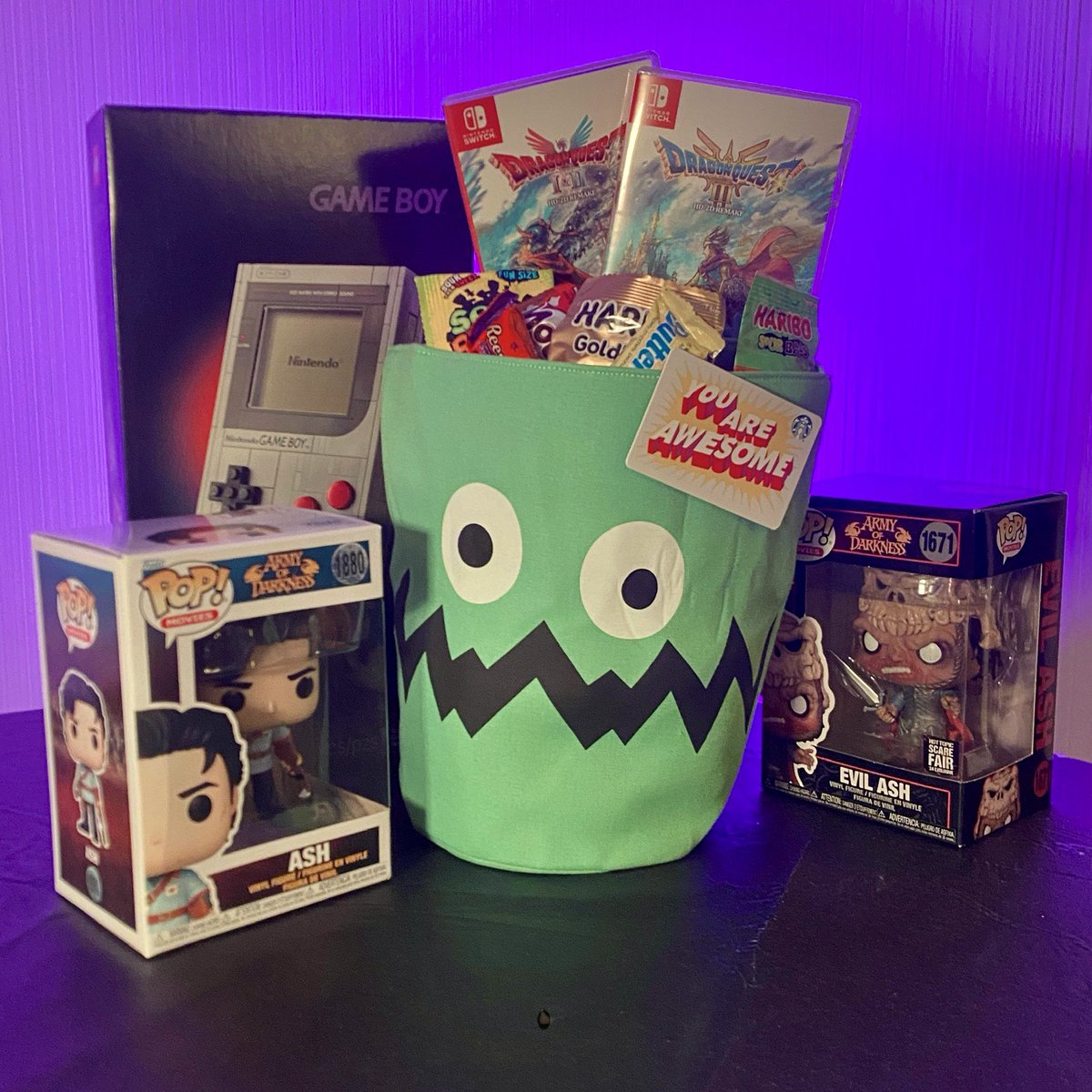 TanookiTee's tweet photo. My Halloween Self-Care Candy bucket for this year. Happy Halloween, everybody!!! 😀❤️🎃👻

#happyhalloween #halloween #halloween2025 #legogameboy #FunkoPop #DragonQuest https://t.co/yO6GDeqyXY