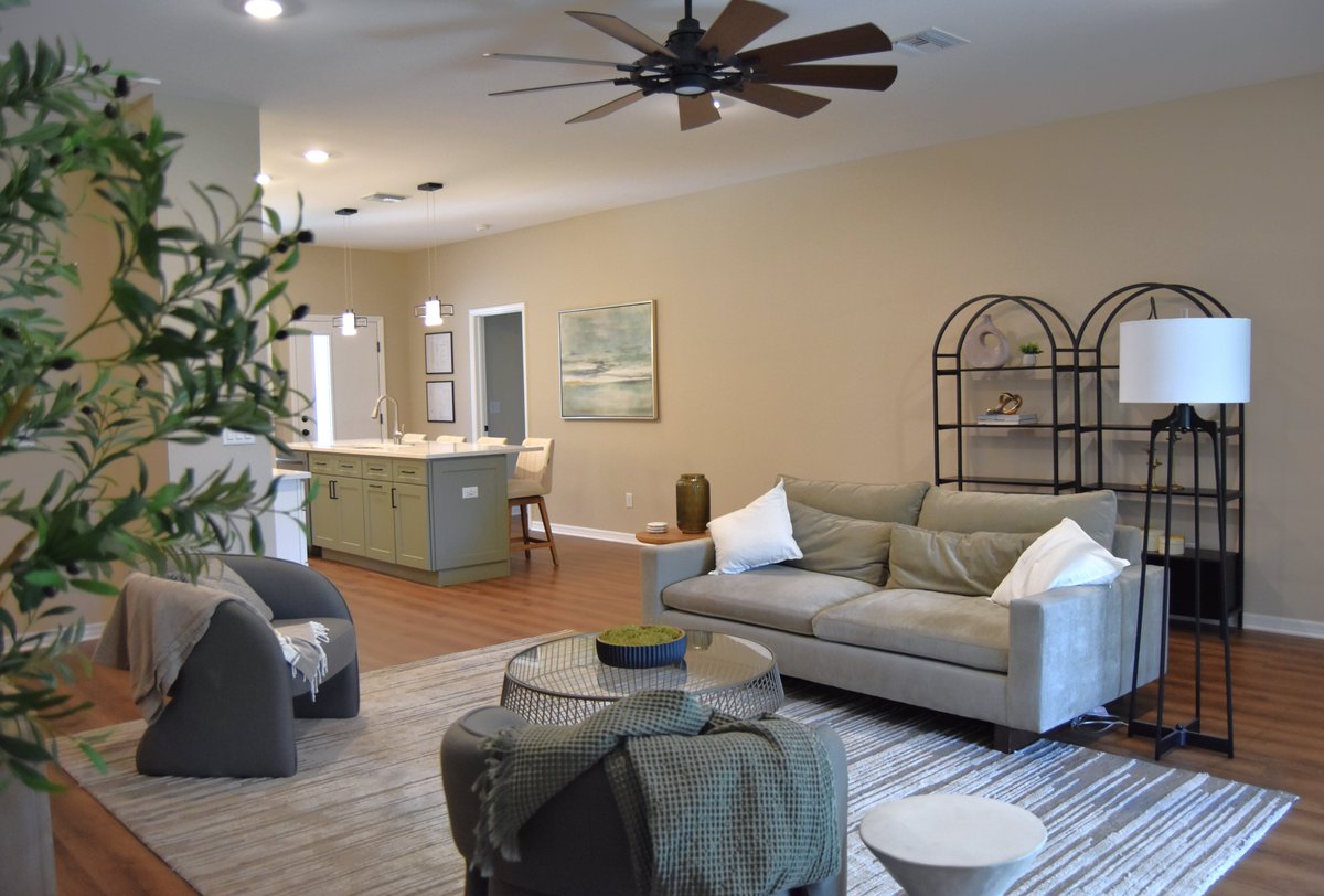 AmHousingVal's tweet photo. Pics of the kitchen and living area from a 'Risky Situation'... we love the sage green island with warm veining in the quartz countertops. The hand-laid tile backsplash ties it all in with the beautiful flooring! https://t.co/wrC0LIFhdf