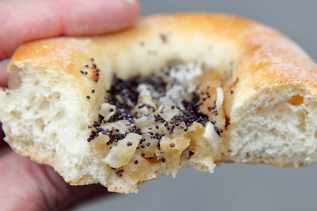Onion bialy (biteaway view), Kossar's, West 72nd St., Manhattan