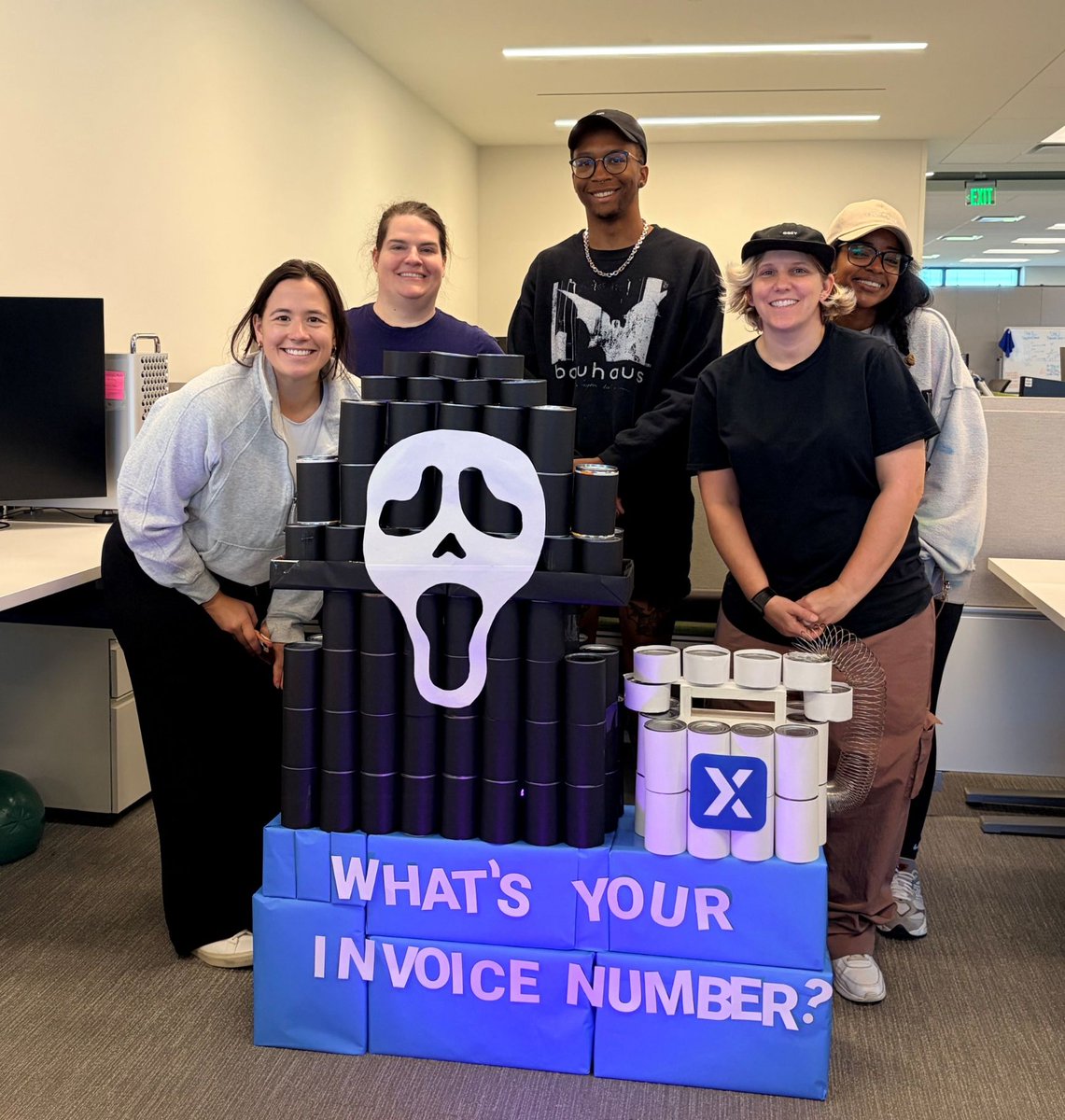 AvidXchange's tweet image. Across the office, teammates celebrated Halloween with festive costumes and creative canned-good builds that doubled as a food drive in support of Nourish Up, blending seasonal fun with community impact. 🎃