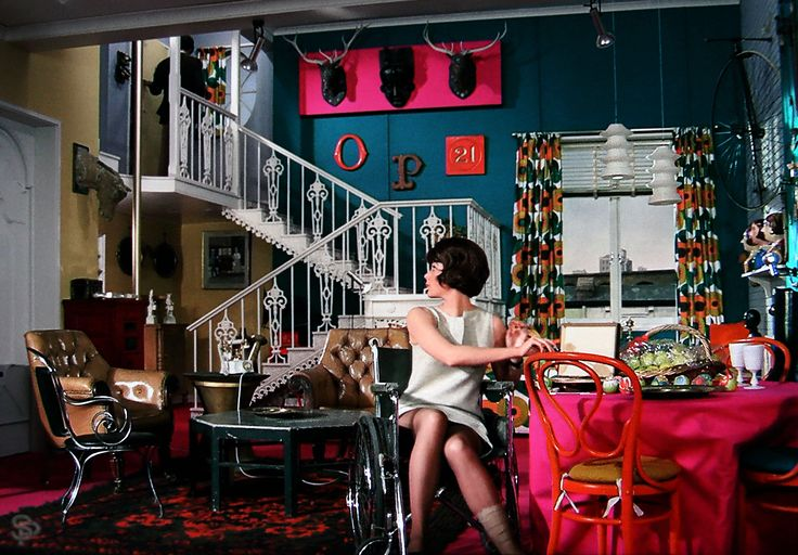 The Swinging 60s has made way for Flower Power and Tara King's apartment reflects that. Decorated in an Objet Trouvé style. The designer &amp; set-dresser opted for a late-60s ‘Kookie’ décor, including a fire station pole waiting to be used by Steed, or perhaps intruding villains.