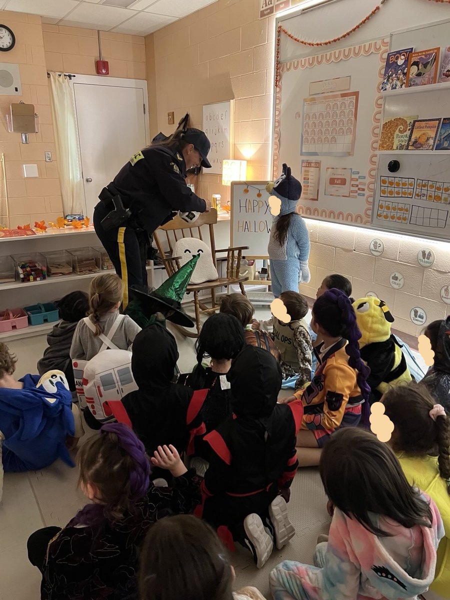 RCMPNB's tweet photo. Cst. Wood of the #Codiac Regional #RCMP visited Edith Cavell School and École Sainte-Bernadette this morning and spoke to students and staff about Halloween Safety. The students were very attentive and asked some great questions! Happy, safe Halloween! https://t.co/KeE9VK7ac5
