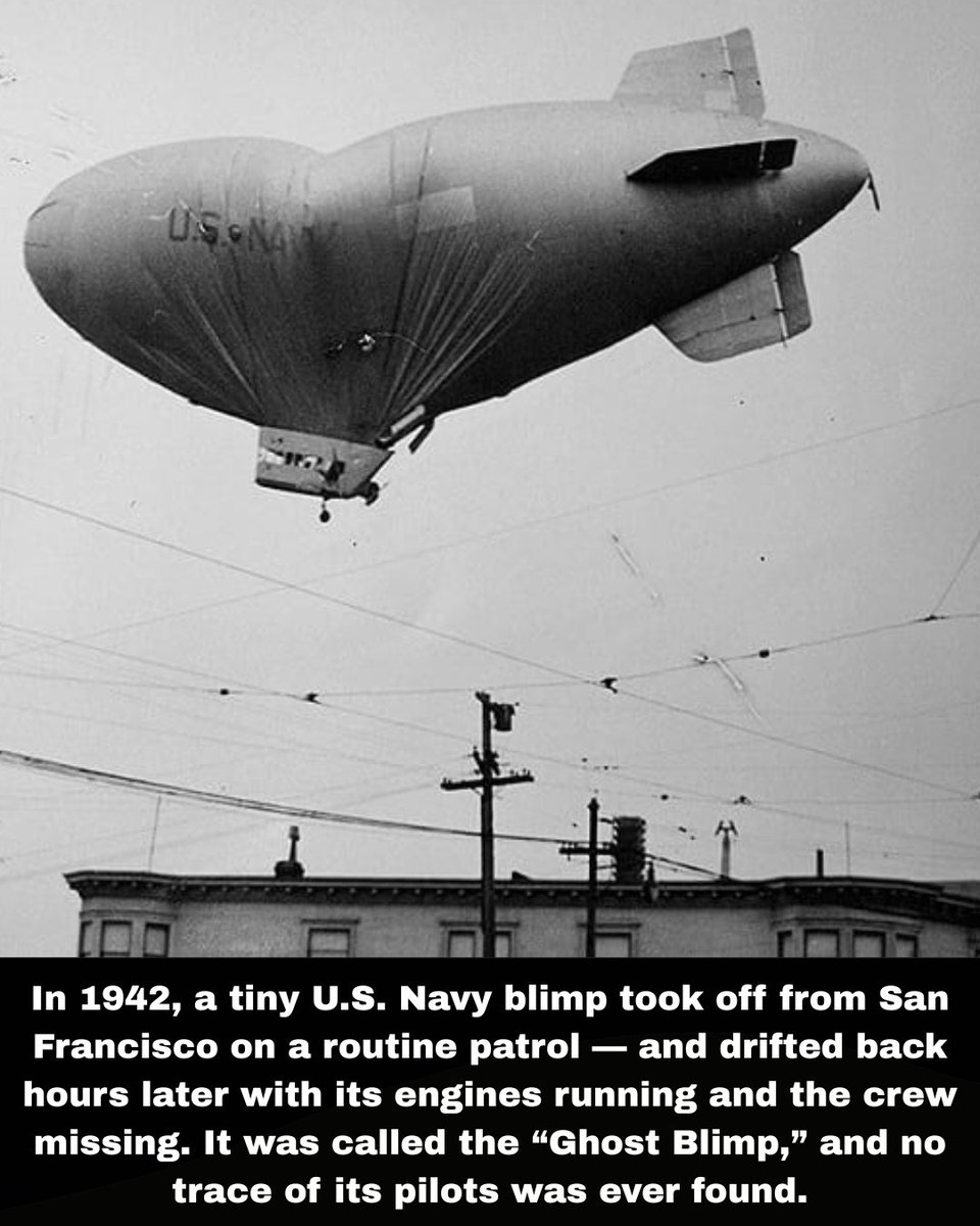 MystFacts's tweet photo. On August 16, 1942, Navy blimp L-8 left Treasure Island, California, carrying two experienced crewmen — Lt. Ernest Cody and Ensign Charles Adams — to search for submarines off the coast. The mission was routine, and they radioed that they’d spotted an oil slick, possibly from a Japanese sub. Then — silence. Hours later, the blimp drifted inland, scraping rooftops before gently crashing in Daly City.

When rescuers opened the cabin, they found something chilling: the engines were on, radio working, parachutes still there, and the door open. But the crew was gone — vanished into thin air. No bodies were ever recovered, and no sign of struggle was found. It was as if the two men had simply stepped out midair.

The Navy’s investigation concluded nothing — no enemy activity, no foul play, no mechanical failure. Theories range from an overboard accident to something far stranger. The Ghost Blimp of 1942 remains one of the eeriest unsolved mysteries of World War II — a haunting story of two men who took to the skies and never came back.