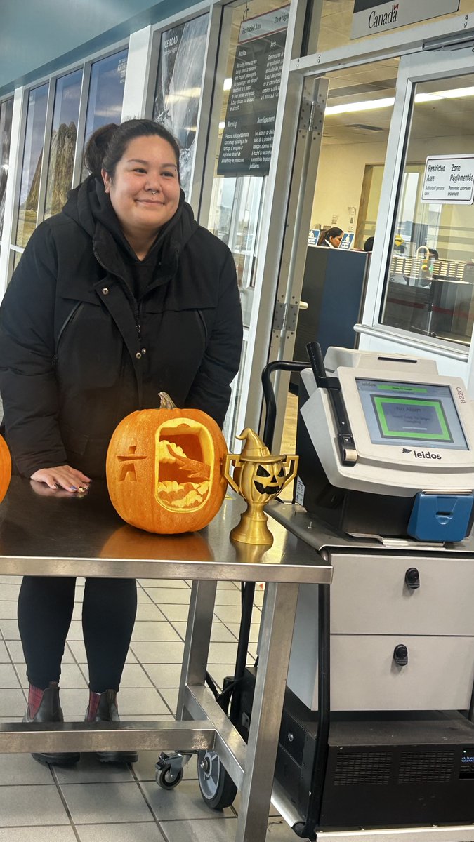 flyyzf's tweet photo. 🎃Our terminal turned into a pumpkin patch of creativity! Huge congrats to the winners of our Airport Pumpkin Carving Contest, your spooky skills took flight! @canadiannorth🏆🧡 Thanks to all who joined in the fun and made this Halloween unforgettable. #PumpkinPros #Halloween2025 https://t.co/jgjub5n7Dz
