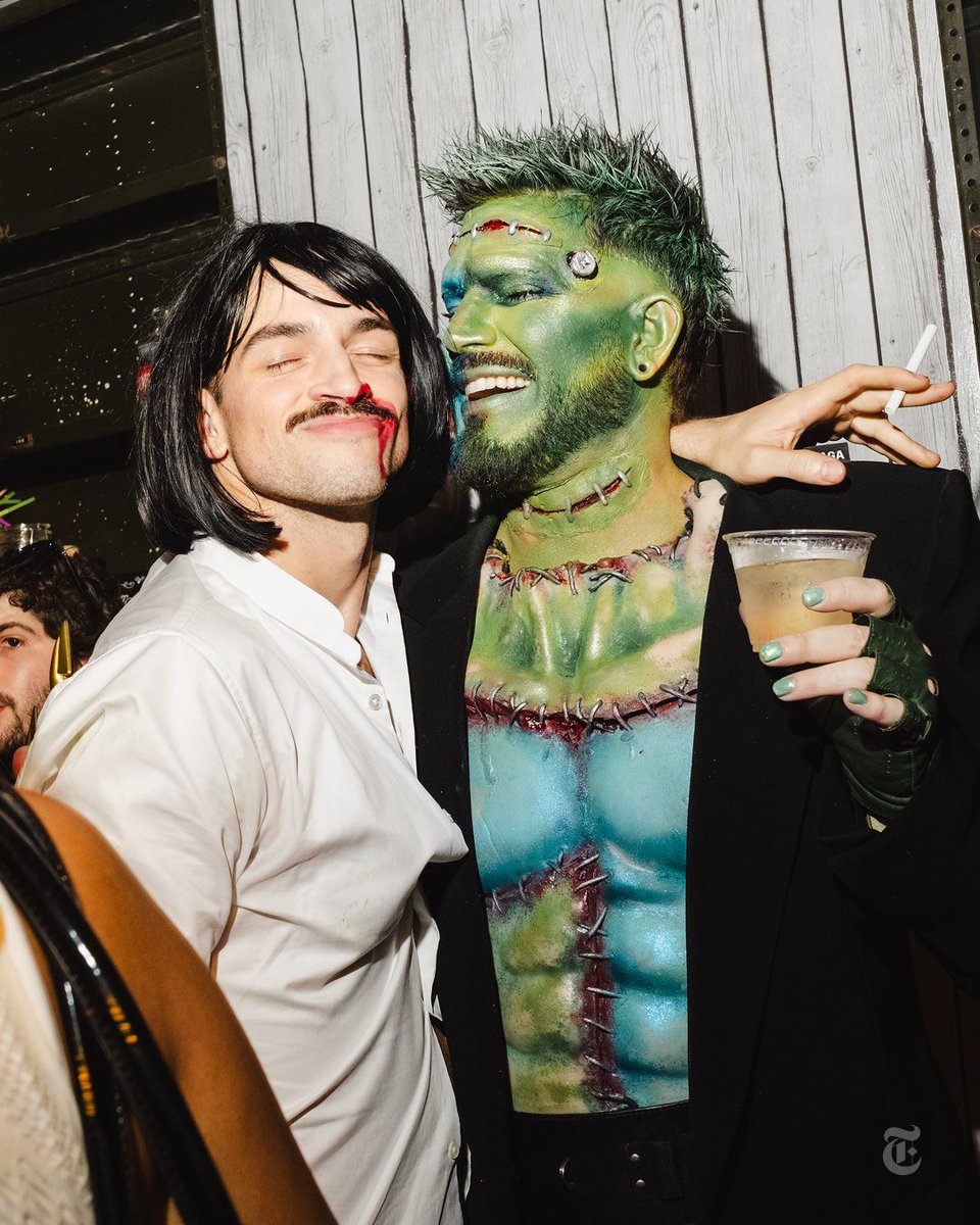 adamlambert had spent at least 3 hours applying makeup and prosthetics . He  greeted David Mattar Merten, dressed as Mia Wallace, Uma Thurman's  character in “Pulp Fiction.” Adam had stitched together, image size:960x1200