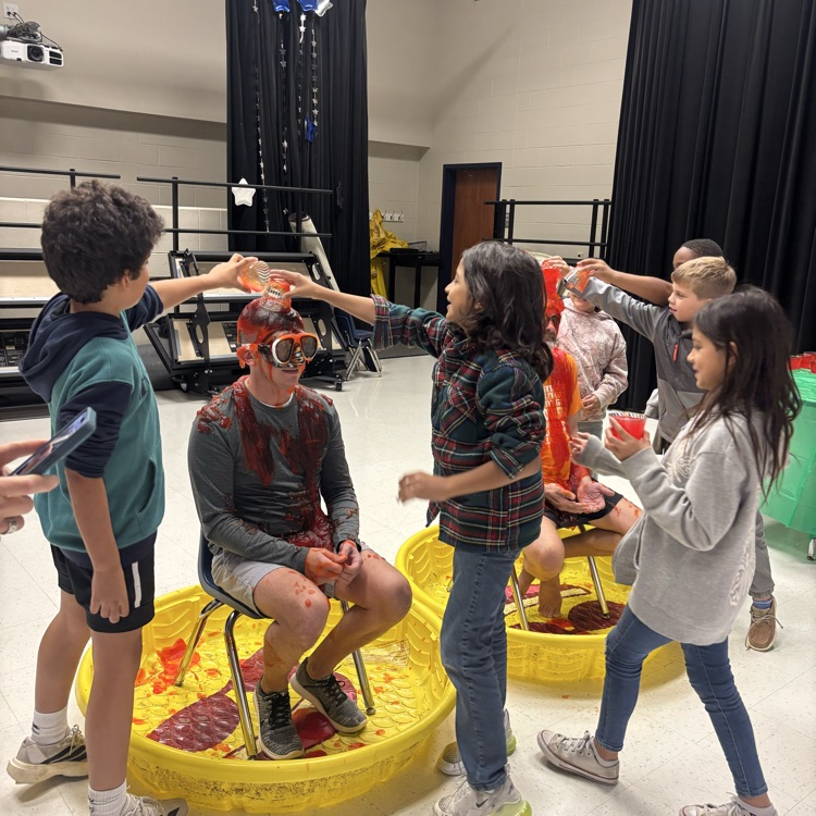 Congratulations to Mrs. Johnstons 1st grade class for winning the Boosterthon Goal Award. They were excited to slime Coach Relle &amp; Mr. Bourgeois today with their 4th grade buddy class!