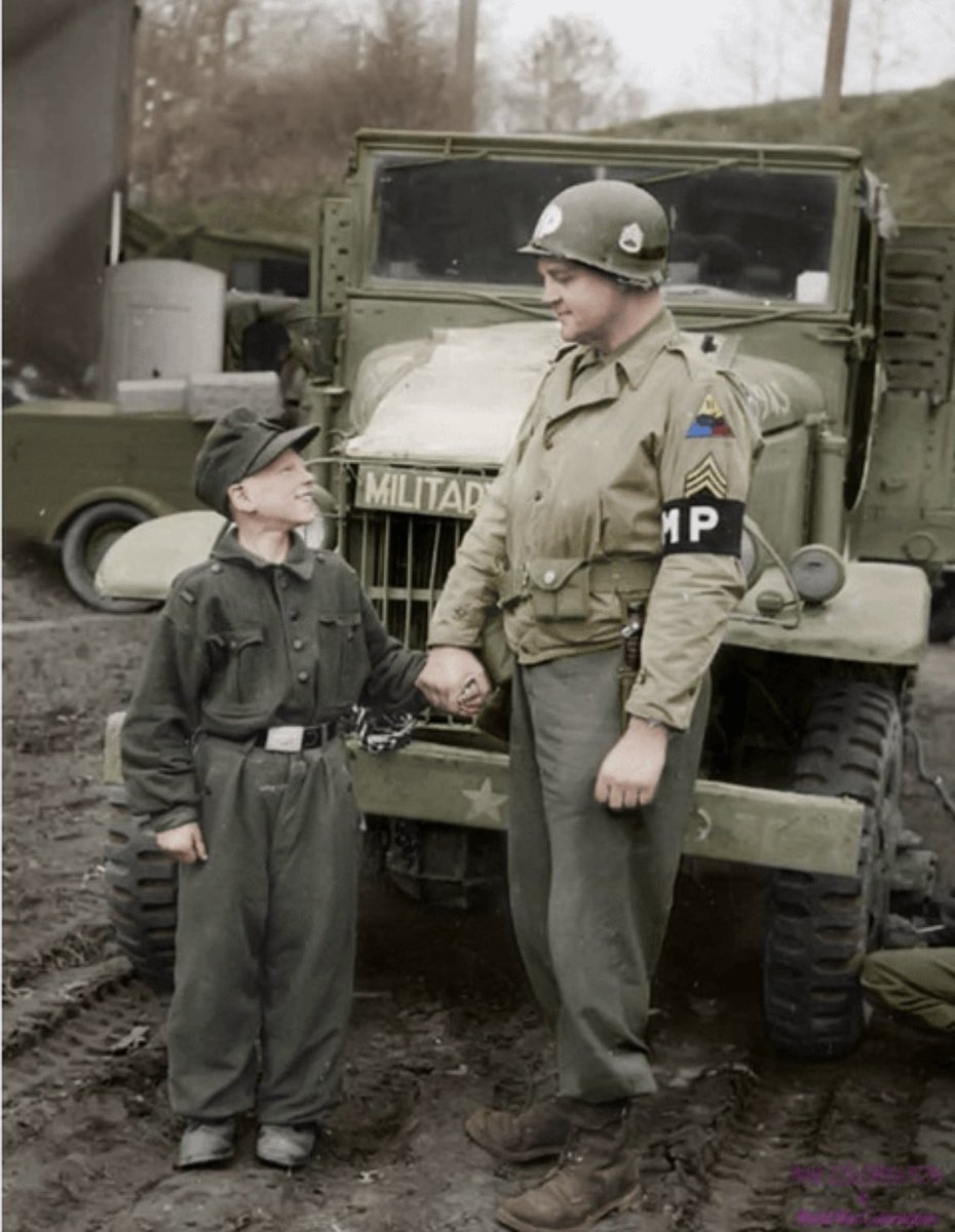 US Staff Sergeant Francis Daggertt of the 11th Armored Division with a young Wehrmacht soldier. The German was only 10 years old when captured in the German city of Kronach on April 27, 1945