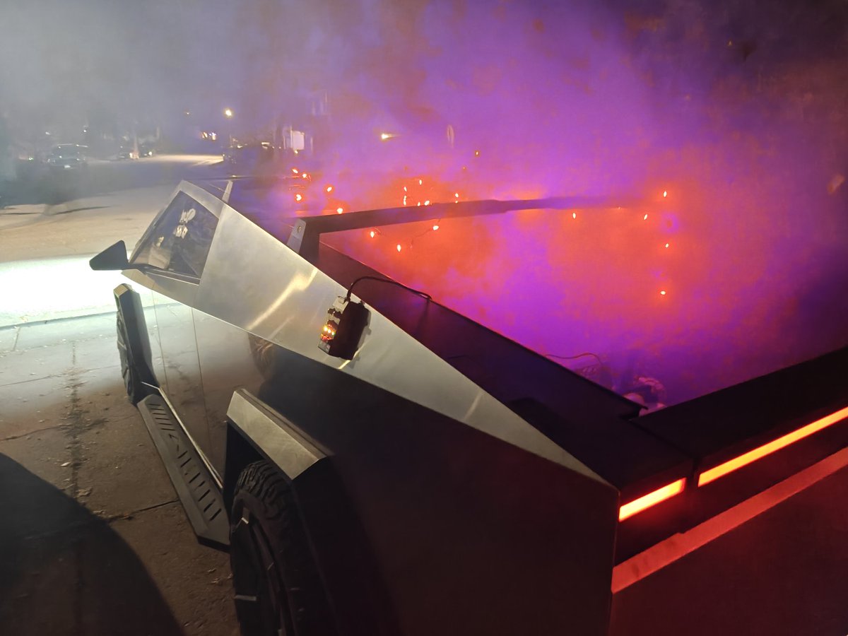 PurpleTeamNinja's tweet photo. @elonmusk, @DenverTeslaClub annual truck or treat handing out candy from the back of a smoke machine equipped CyberTruck complete for year two.  My kids love it, and they have such a great time telling people all about the 📐. https://t.co/ecayz9xzmJ