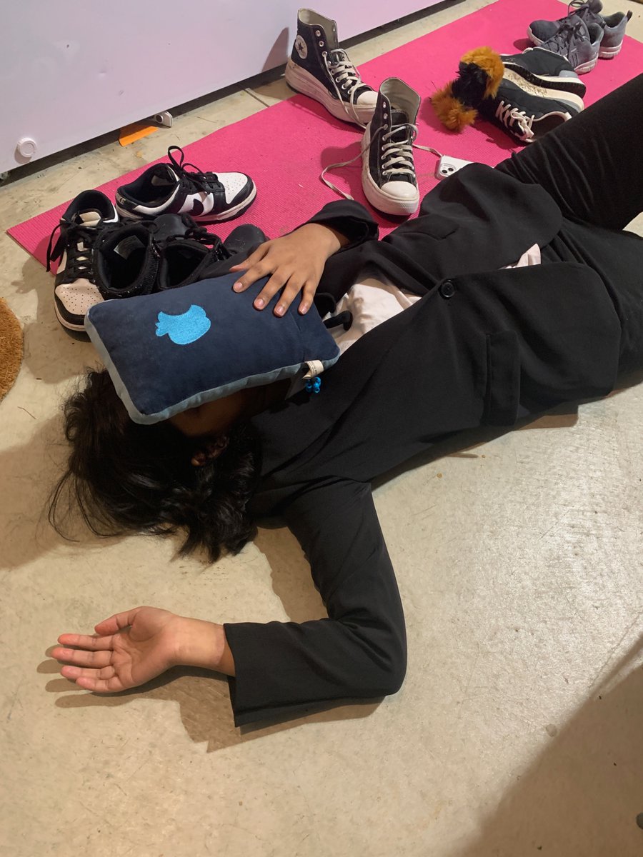 Mangodexter's tweet image. emo queer couple makes out on the garage floor